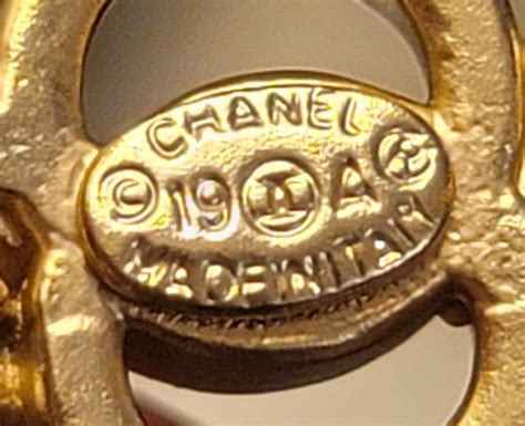 fake chanel charm|authentic Chanel jewelry stamp.